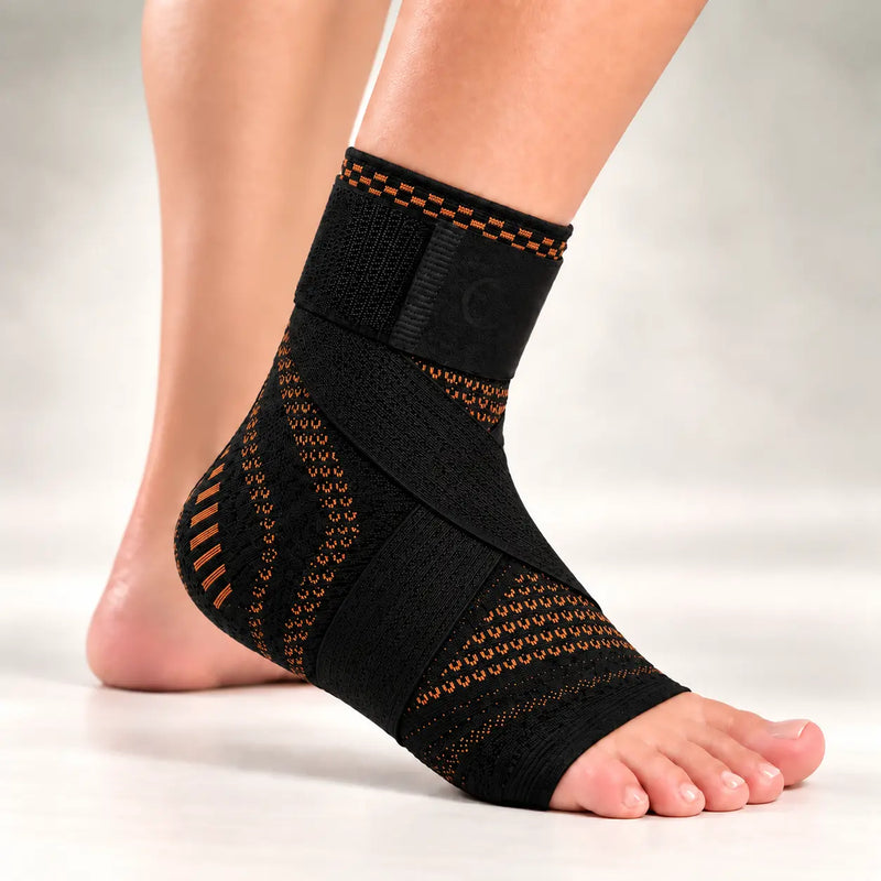 Woman wearing Clearvell Copper OrthoPro Foot Sleeve with adjustable straps and covered heel
